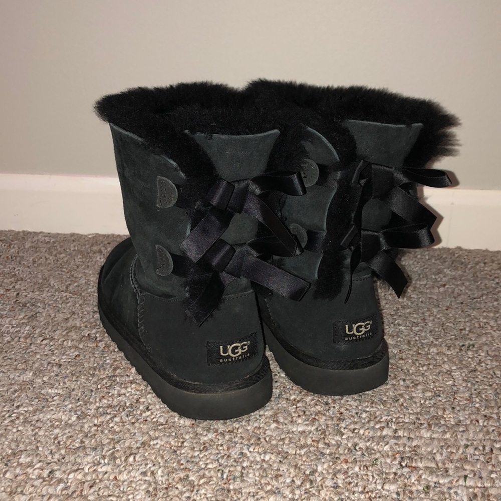 Black Ugg boots with bows on the back